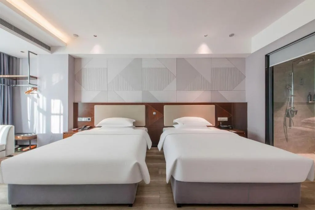 Bed in Borrman Hotel Yunfu Xinxing County Bus Station