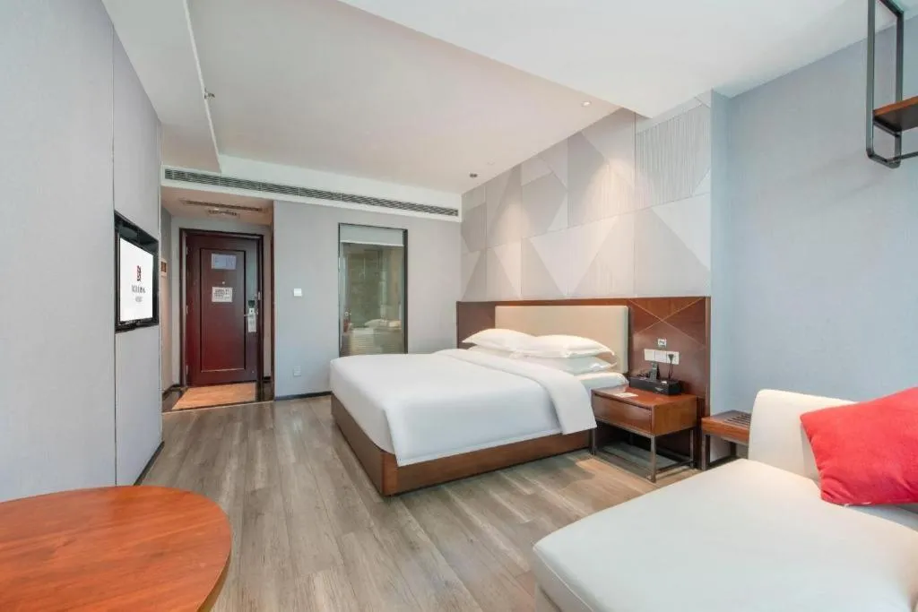 Bed in Borrman Hotel Yunfu Xinxing County Bus Station