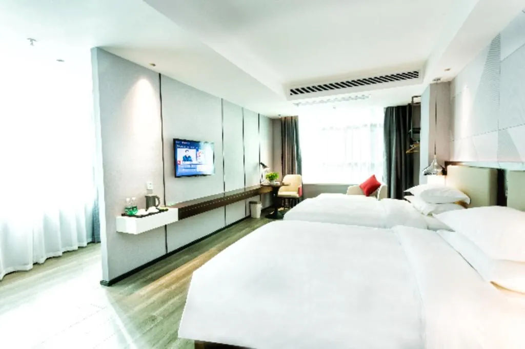 Bed in Borrman Hotel Yunfu Xinxing County Bus Station