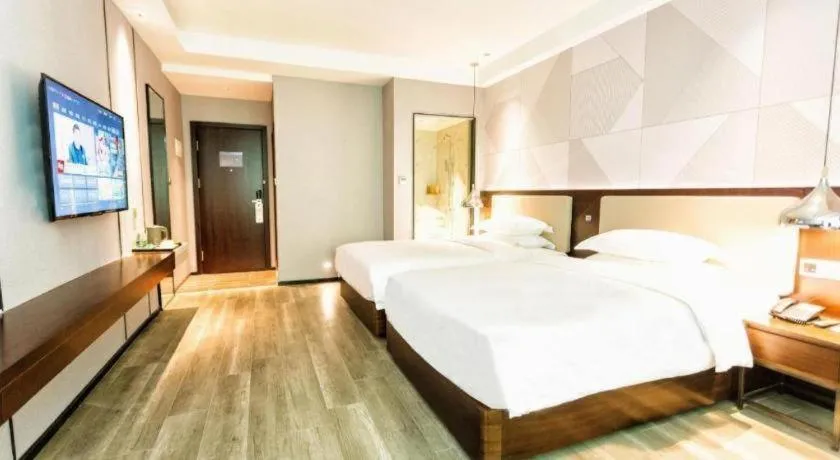 Bed in Borrman Hotel Yunfu Xinxing County Bus Station