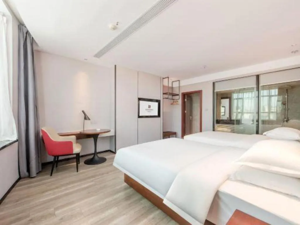 Bed in Borrman Hotel Yunfu Xinxing County Bus Station