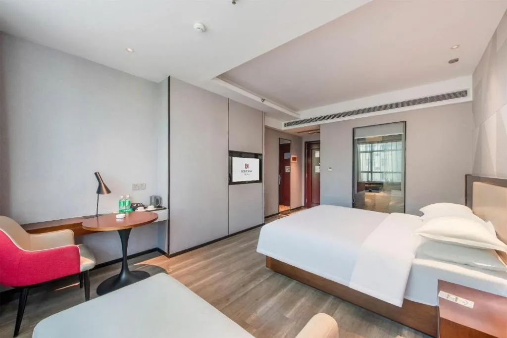 Bed in Borrman Hotel Yunfu Xinxing County Bus Station