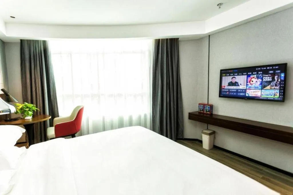 Bed in Borrman Hotel Yunfu Xinxing County Bus Station