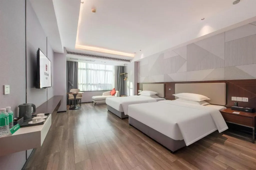 Bed in Borrman Hotel Yunfu Xinxing County Bus Station