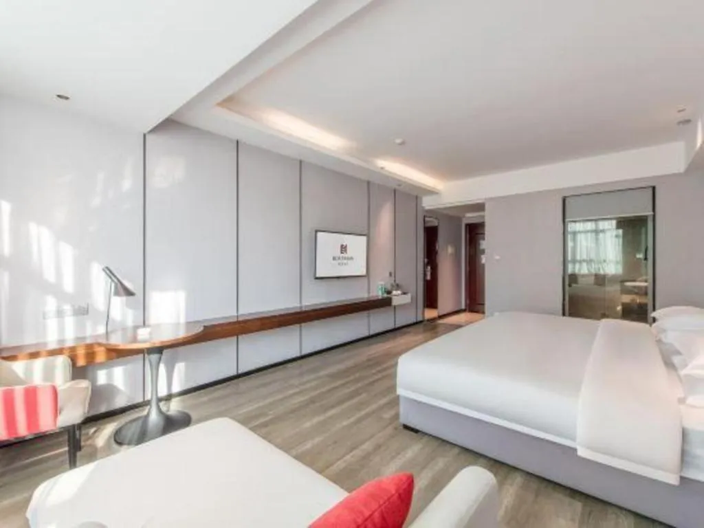 Bed in Borrman Hotel Yunfu Xinxing County Bus Station