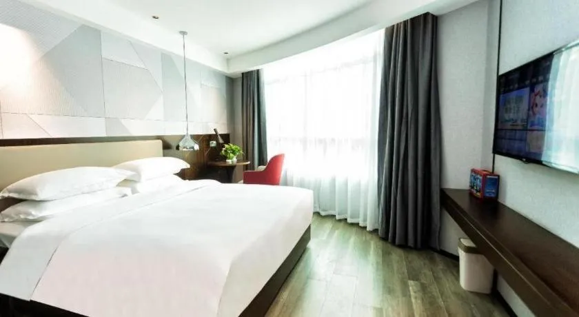 Bed in Borrman Hotel Yunfu Xinxing County Bus Station