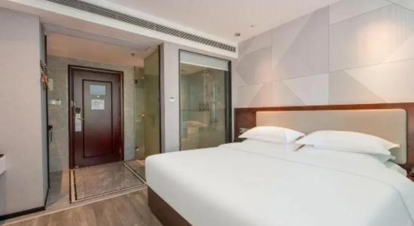 Bed in Borrman Hotel Yunfu Xinxing County Bus Station