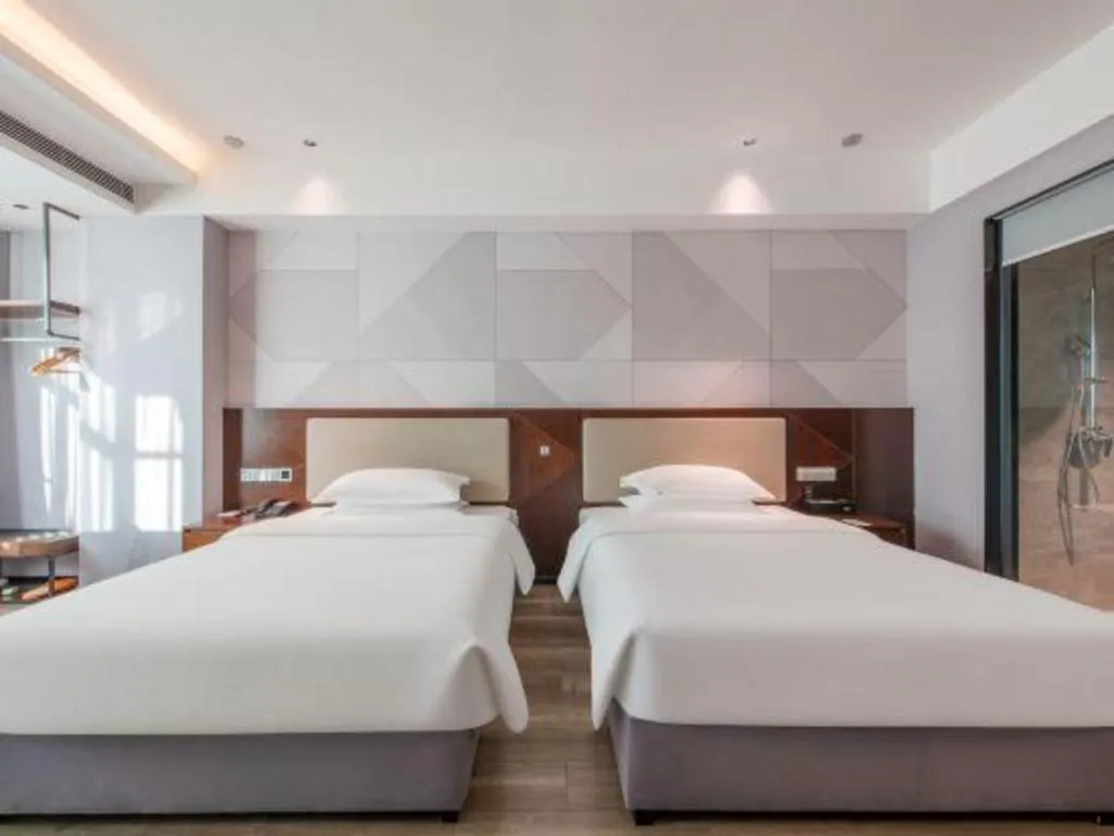 Bed in Borrman Hotel Yunfu Xinxing County Bus Station