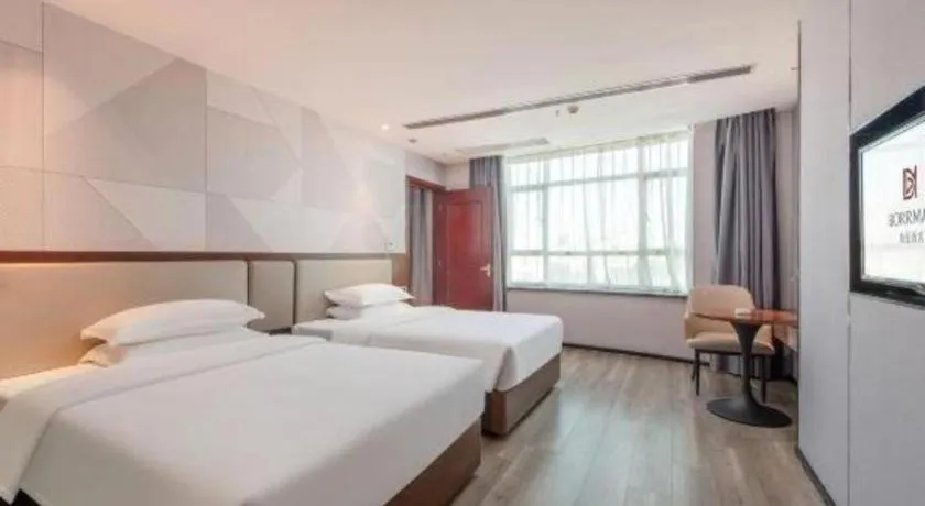 Bed in Borrman Hotel Yunfu Xinxing County Bus Station