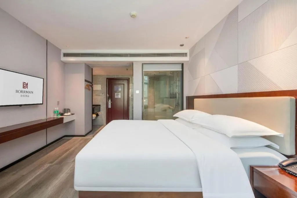 Bed in Borrman Hotel Yunfu Xinxing County Bus Station