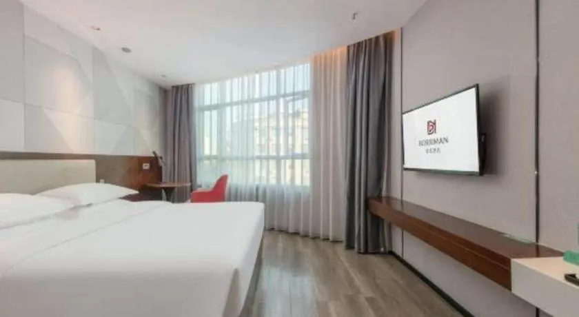 Bed in Borrman Hotel Yunfu Xinxing County Bus Station