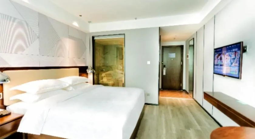 Bed in Borrman Hotel Yunfu Xinxing County Bus Station