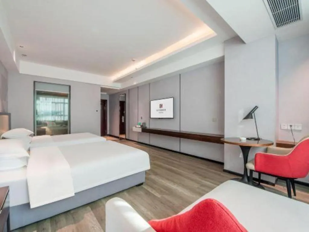 Bed in Borrman Hotel Yunfu Xinxing County Bus Station