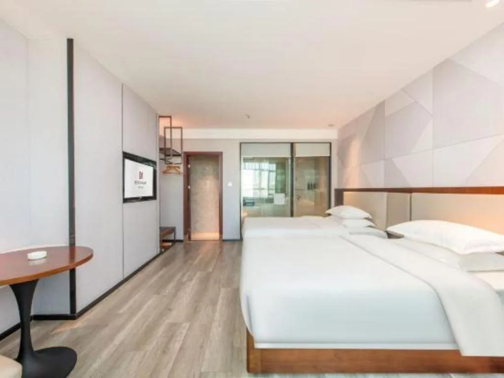 Bed in Borrman Hotel Yunfu Xinxing County Bus Station