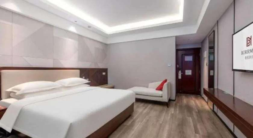 Bed in Borrman Hotel Yunfu Xinxing County Bus Station