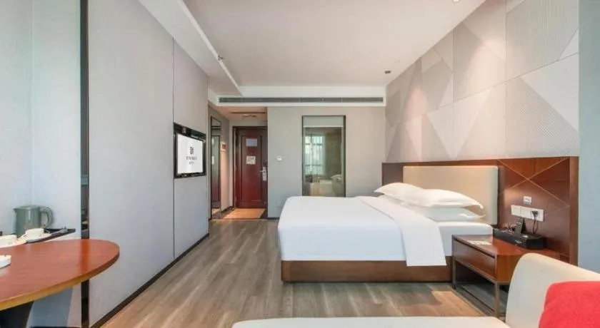 Bed in Borrman Hotel Yunfu Xinxing County Bus Station