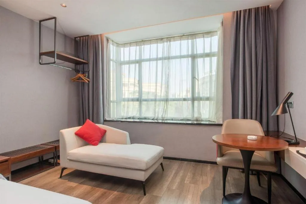 Bed in Borrman Hotel Yunfu Xinxing County Bus Station