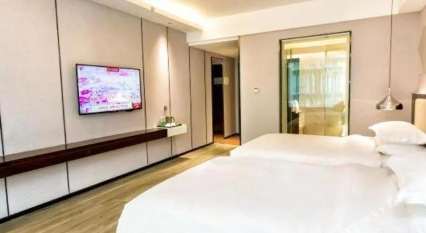 Bed in Borrman Hotel Yunfu Xinxing County Bus Station