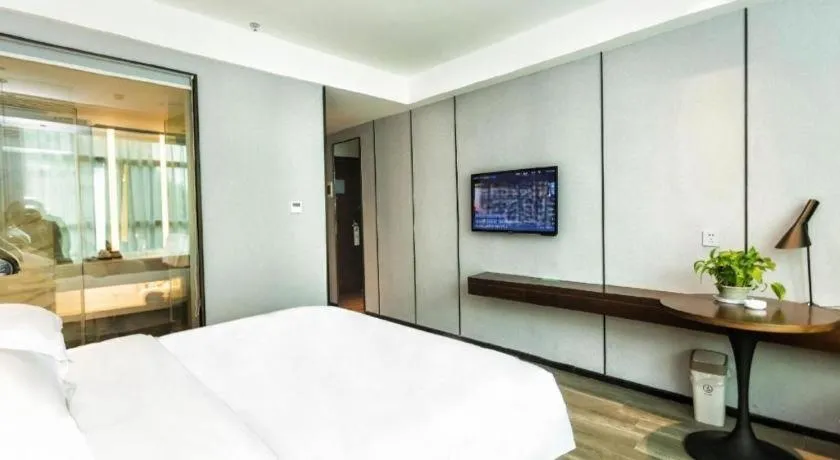 Bed in Borrman Hotel Yunfu Xinxing County Bus Station