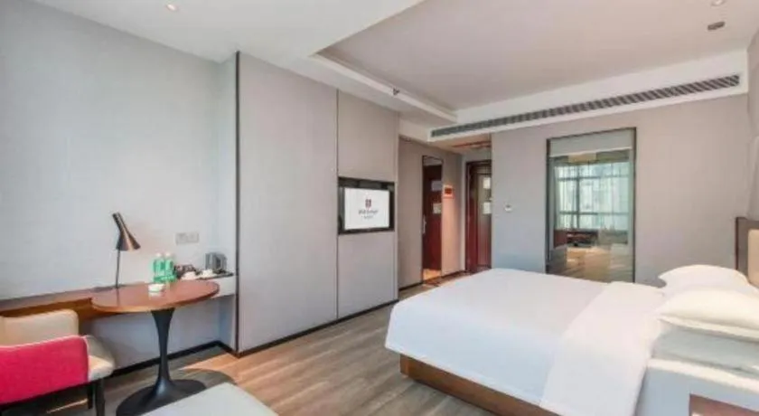 Bed in Borrman Hotel Yunfu Xinxing County Bus Station