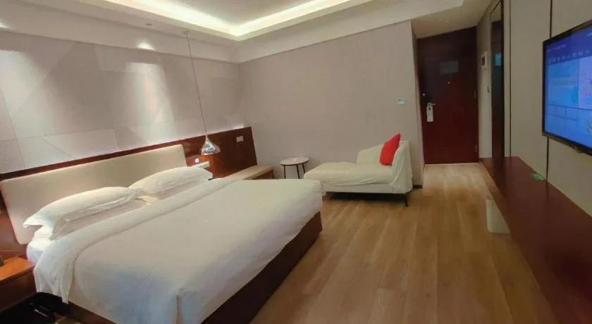 Bed in Borrman Hotel Yunfu Xinxing County Bus Station