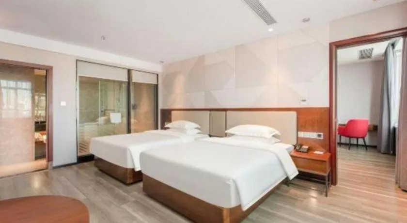 Bed in Borrman Hotel Yunfu Xinxing County Bus Station