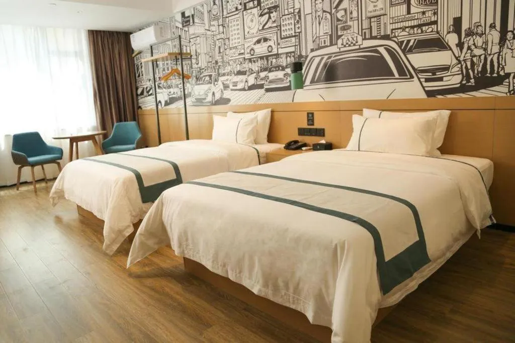 Bed in City Comfort Inn Maoming Binhai New Area Diancheng