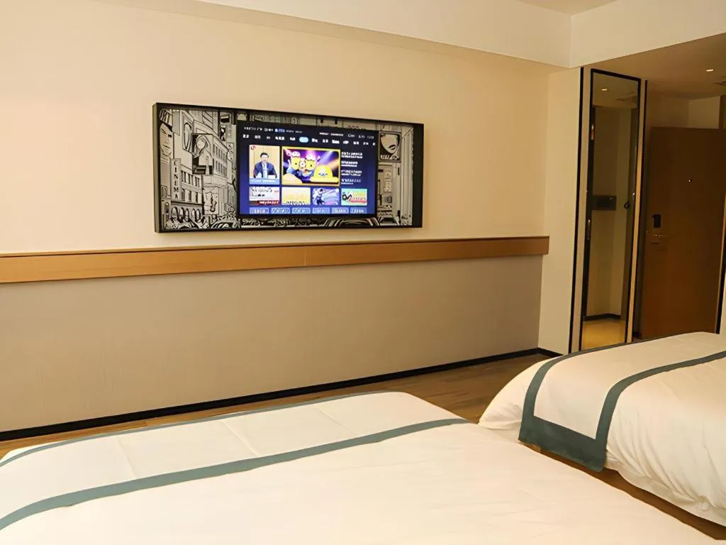 Bed in City Comfort Inn Maoming Binhai New Area Diancheng