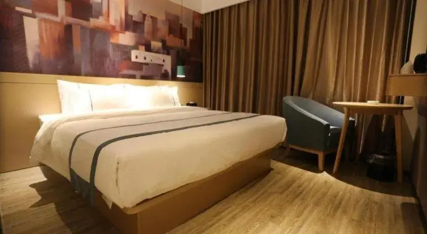 Bed in City Comfort Inn Dalian Changxin Dao Santang Commercial Street Bed in City Comfort Inn Dalian Changxin Dao Santang Commercial Street