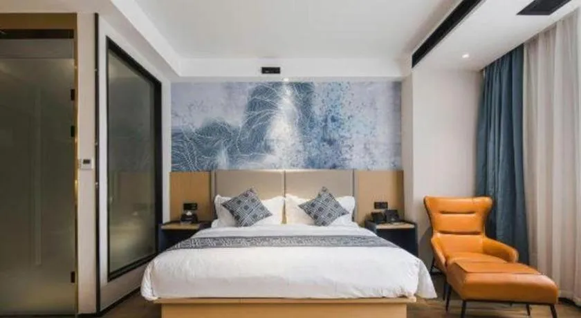 Bed in GEM Hotel Changzhou Xuejia'aoyuan North High-Speed Railway Station