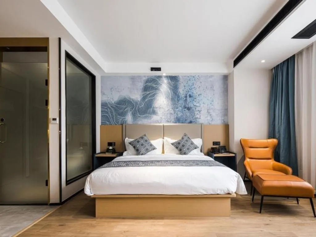 Bed in GEM Hotel Changzhou Xuejia'aoyuan North High-Speed Railway Station