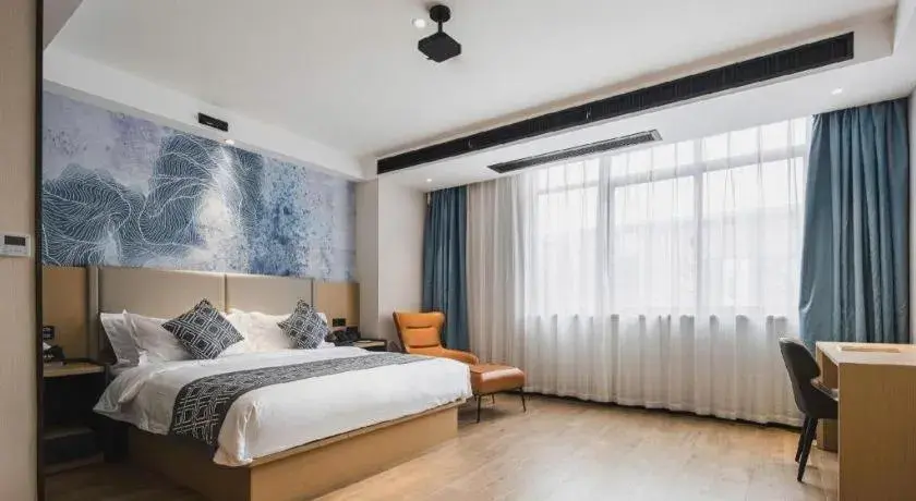 Bed in GEM Hotel Changzhou Xuejia'aoyuan North High-Speed Railway Station Bed in GEM Hotel Changzhou Xuejia'aoyuan North High-Speed Railway Station