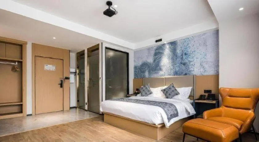 Bed in GEM Hotel Changzhou Xuejia'aoyuan North High-Speed Railway Station