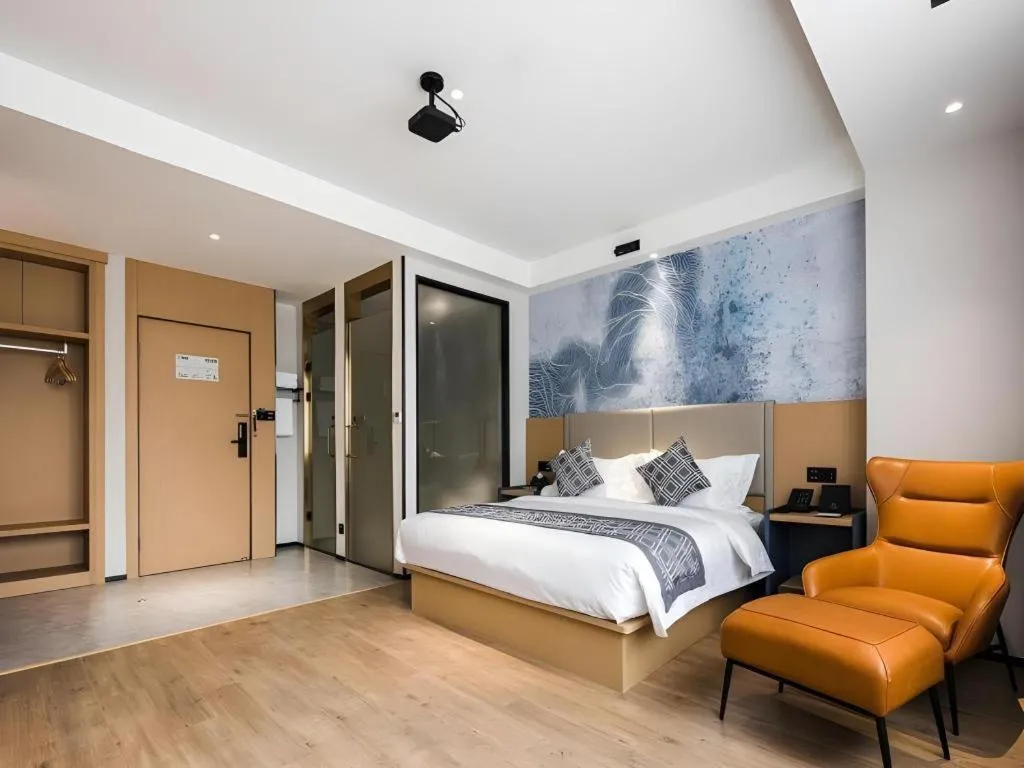 Bed in GEM Hotel Changzhou Xuejia'aoyuan North High-Speed Railway Station