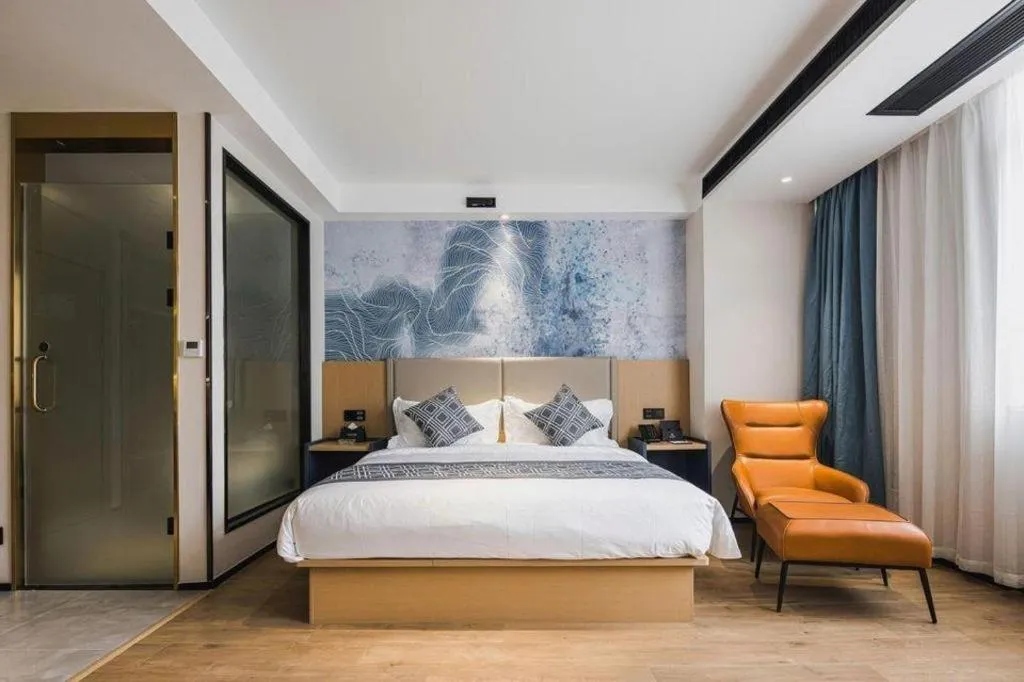 Bed in GEM Hotel Changzhou Xuejia'aoyuan North High-Speed Railway Station