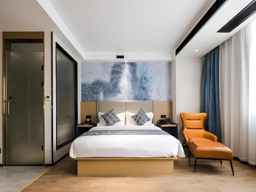 Bed in GEM Hotel Changzhou Xuejia'aoyuan North High-Speed Railway Station