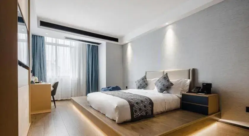 Bed in GEM Hotel Changzhou Xuejia'aoyuan North High-Speed Railway Station Bed in GEM Hotel Changzhou Xuejia'aoyuan North High-Speed Railway Station