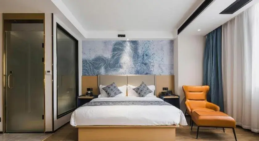 Bed in GEM Hotel Changzhou Xuejia'aoyuan North High-Speed Railway Station Bed in GEM Hotel Changzhou Xuejia'aoyuan North High-Speed Railway Station