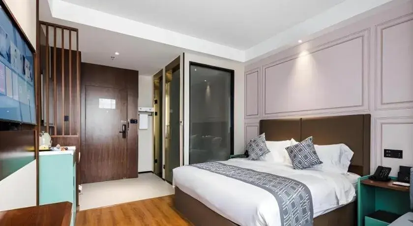 Bed in GEM Hotel Changzhou Xuejia'aoyuan North High-Speed Railway Station Bed in GEM Hotel Changzhou Xuejia'aoyuan North High-Speed Railway Station