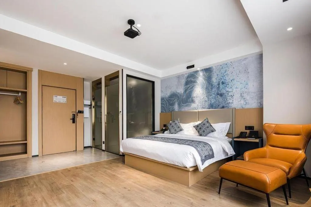 Bed in GEM Hotel Changzhou Xuejia'aoyuan North High-Speed Railway Station