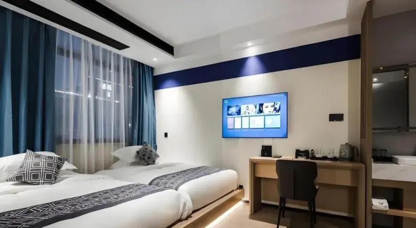 Bed in GEM Hotel Changzhou Xuejia'aoyuan North High-Speed Railway Station Bed in GEM Hotel Changzhou Xuejia'aoyuan North High-Speed Railway Station