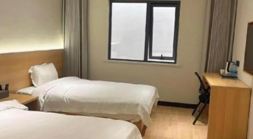 Bed in Shell Hotel Huai'an Zhuqiao Industrial Park