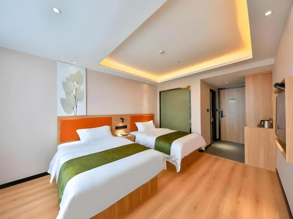 Bed in Green Tree Inn Express Zhejiang Zhoushan Xincheng Zheda