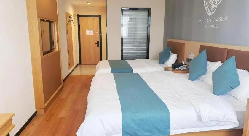 Bed in Shell Hotel Bozhou Lixin County Passenger Center