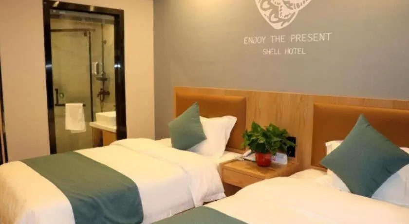 Bed in Shell Hotel Bozhou Lixin County Passenger Center