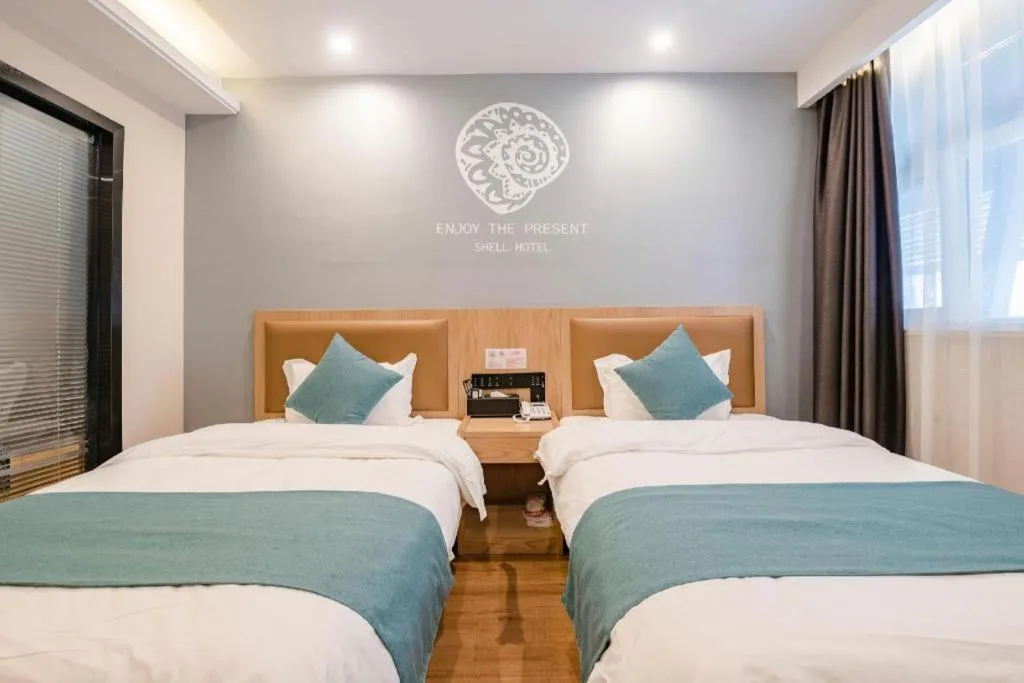 Bed in Shell Hotel Bozhou Lixin County Passenger Center