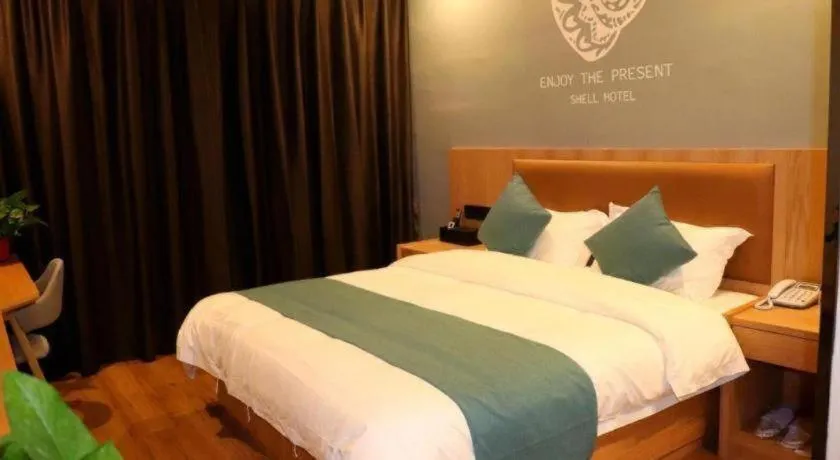 Bed in Shell Hotel Bozhou Lixin County Passenger Center