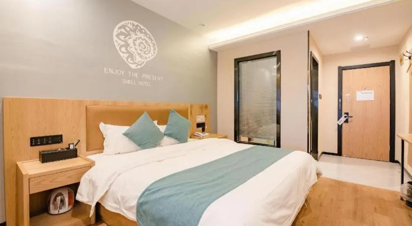 Bed in Shell Hotel Bozhou Lixin County Passenger Center