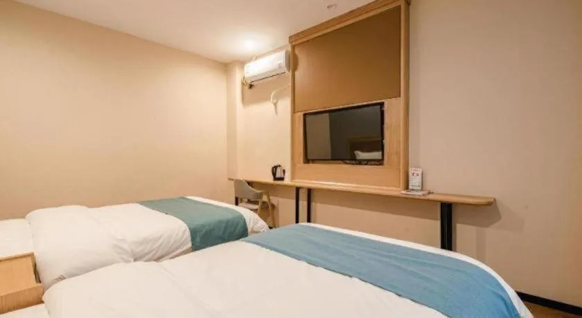 Bed in Shell Hotel Bozhou Lixin County Passenger Center