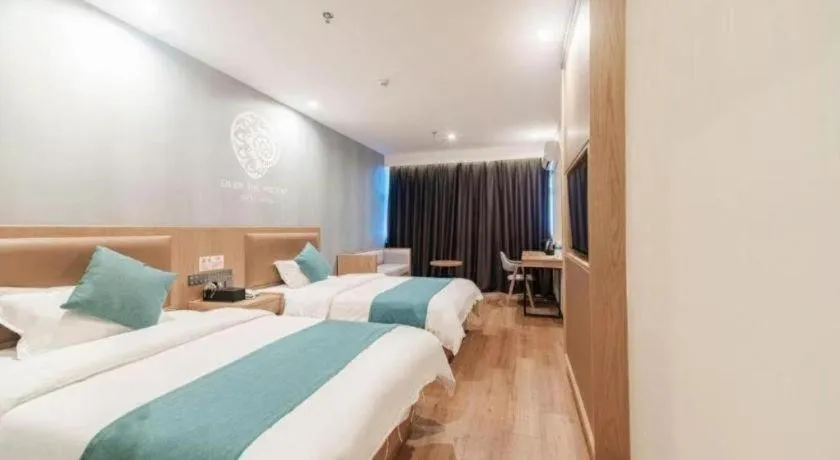 Bed in Shell Hotel Bozhou Lixin County Passenger Center